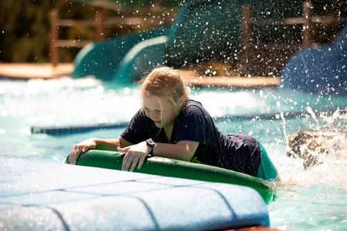 Girl playing in Cove Point Pool