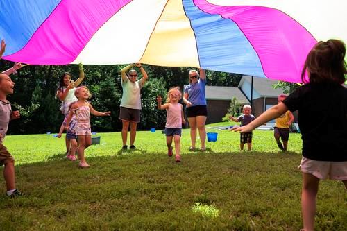 Children Playing with parachute at Southern Community Center