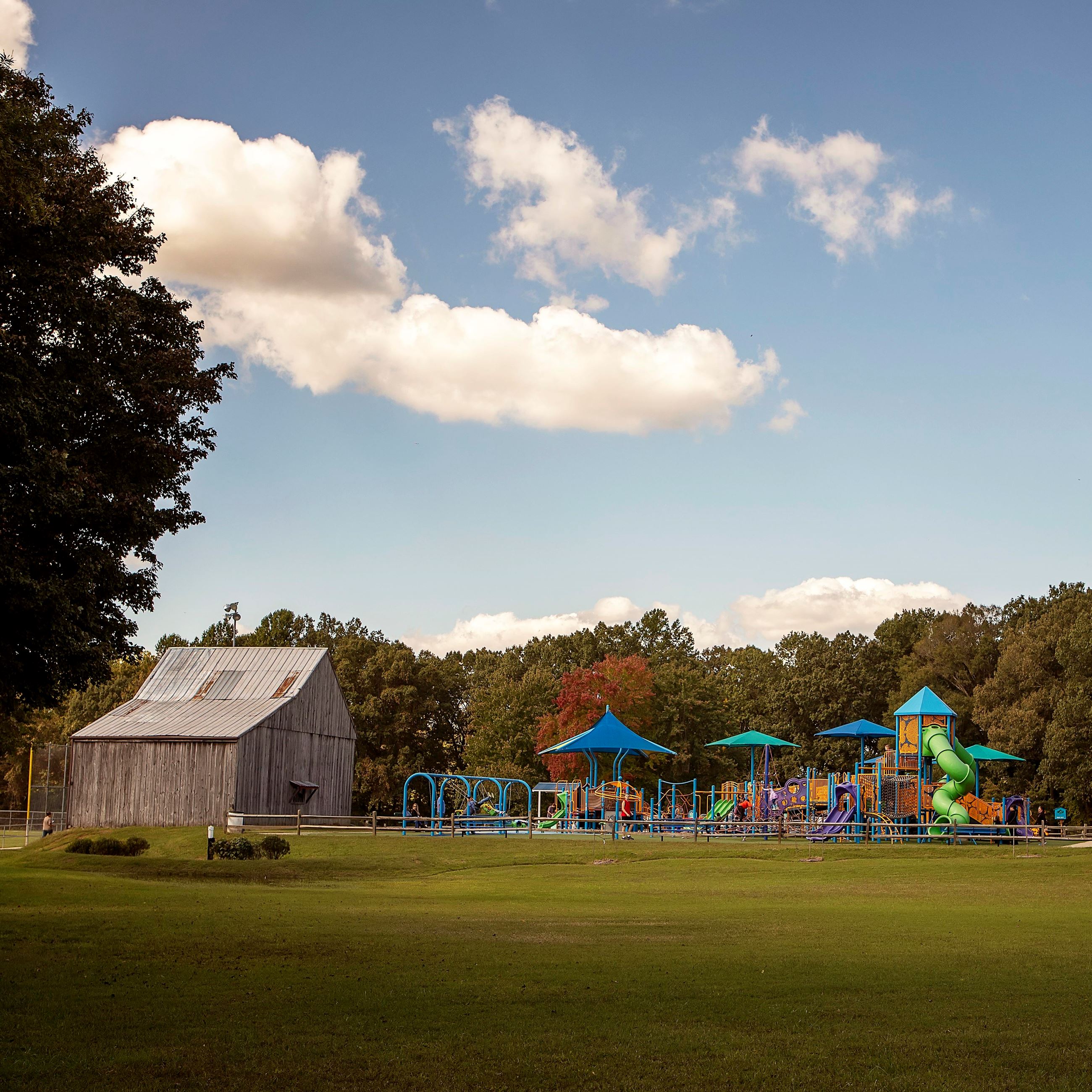 Filed, playground, and barns at Hallowing Point Park