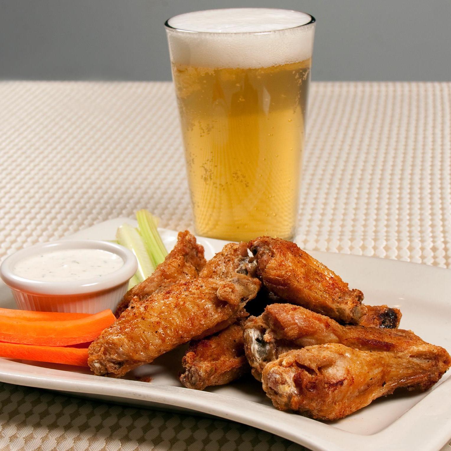 Wings, vegetables with ranch and a beverage