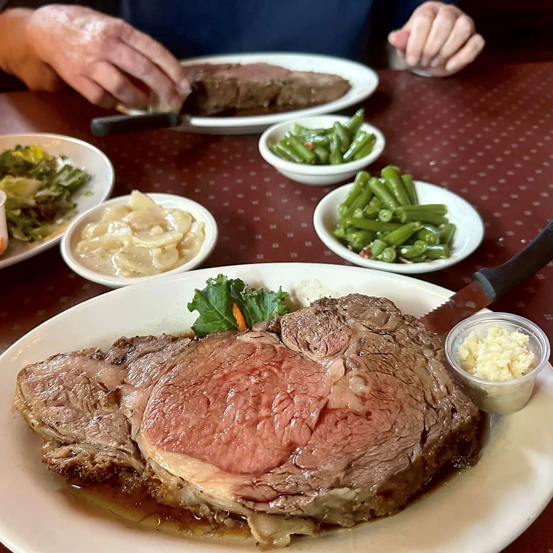 Overlooking a table with two steak dinners