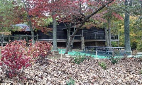 Flag Ponds Nature Center building in fall