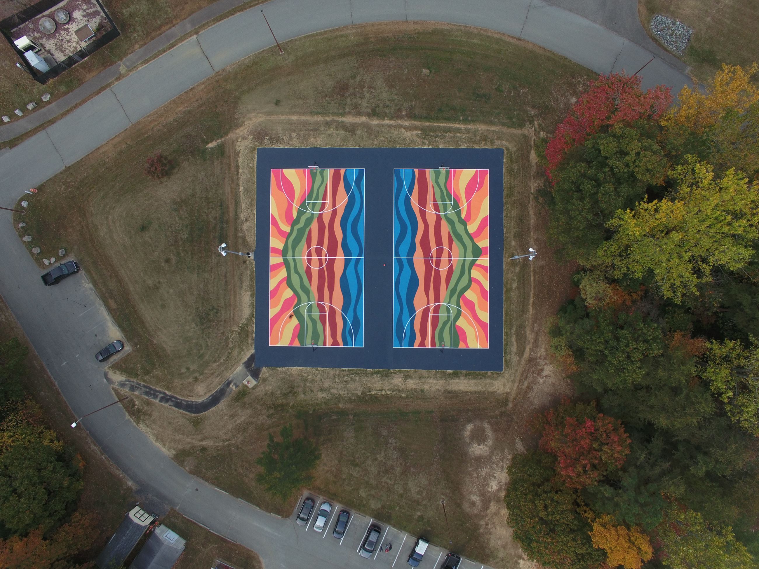 Cove Point Park basketball court mural and surrounding roads and parking areas