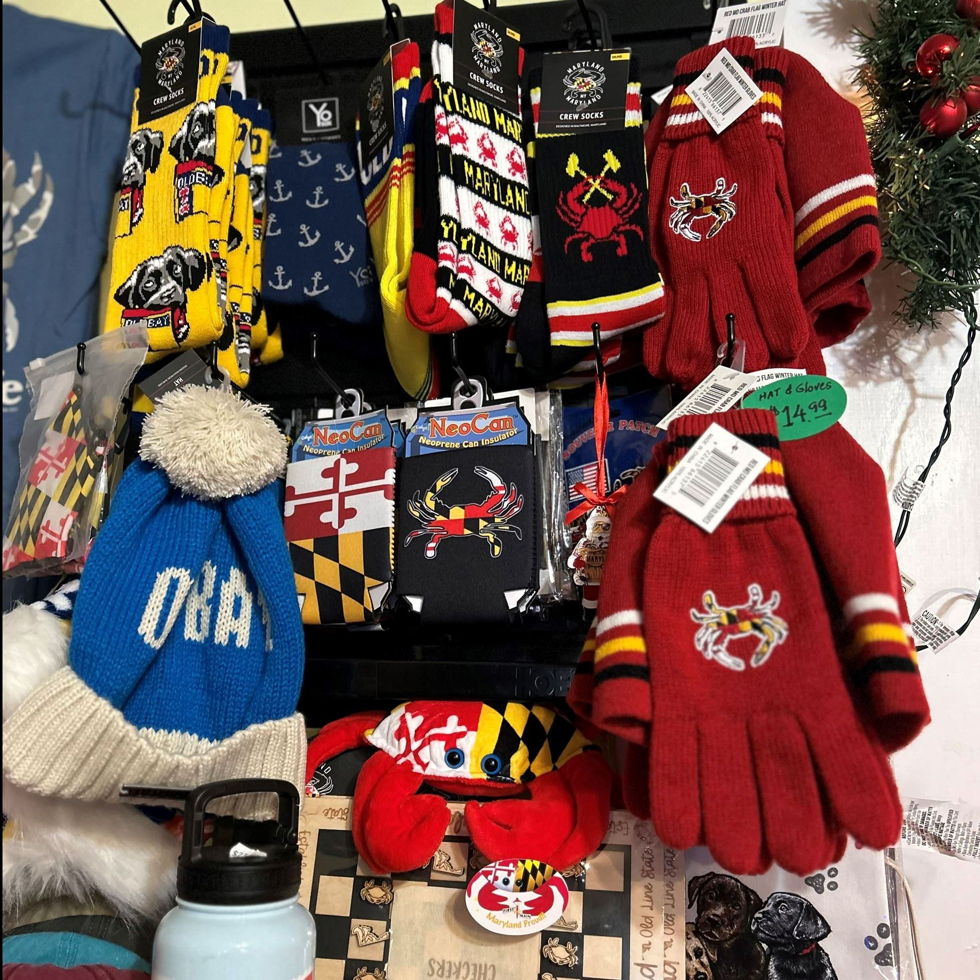 novelty sock and hats for sale on racks