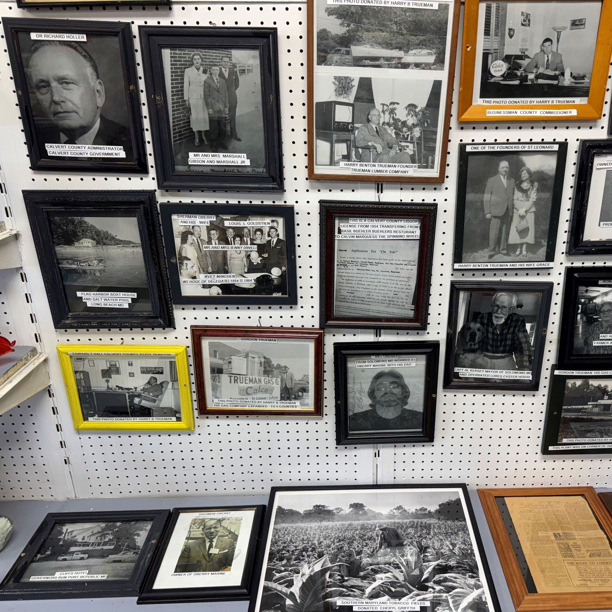 framed vintage photos display on wall